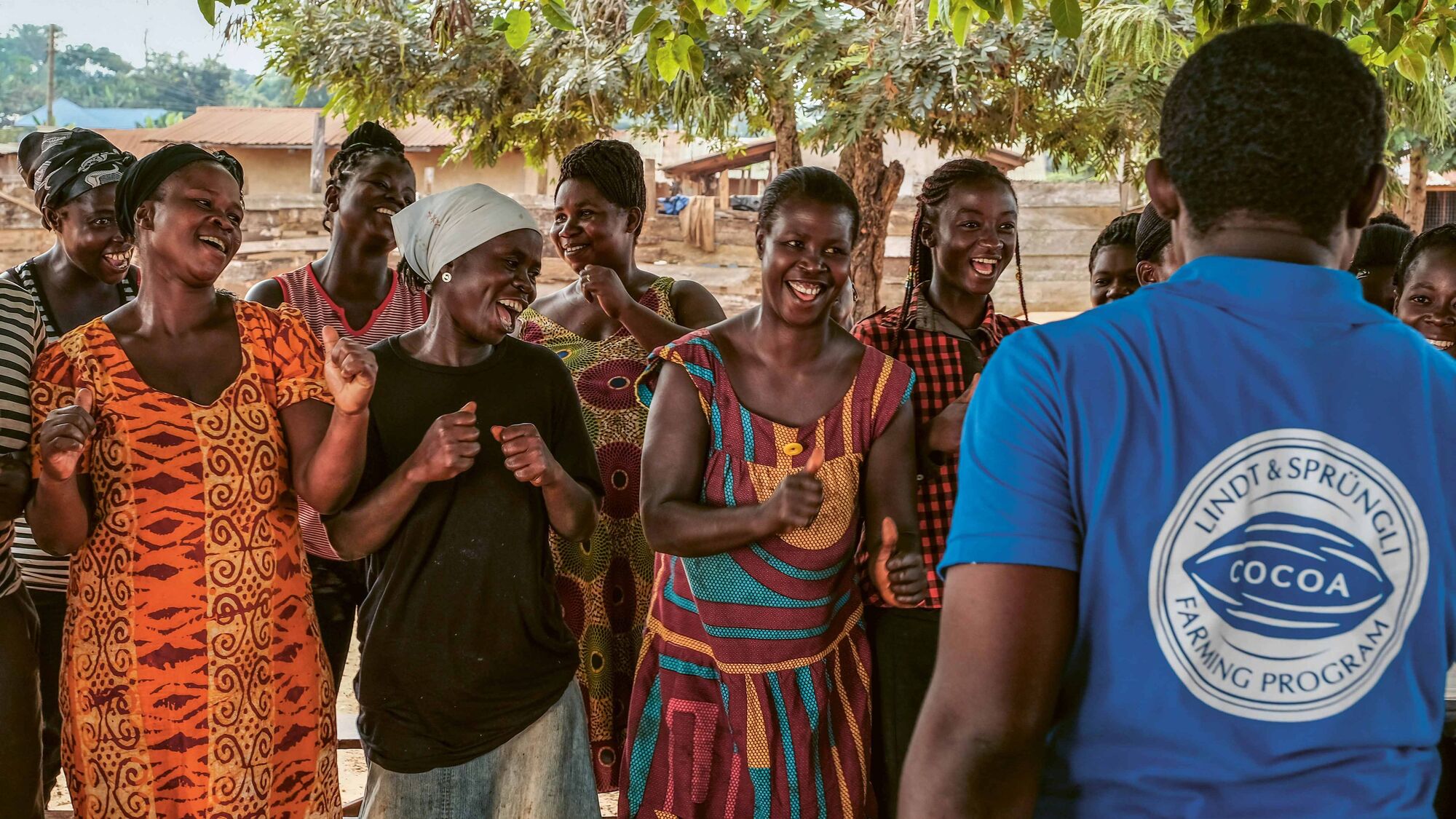 Lindt employee with women in Ghana